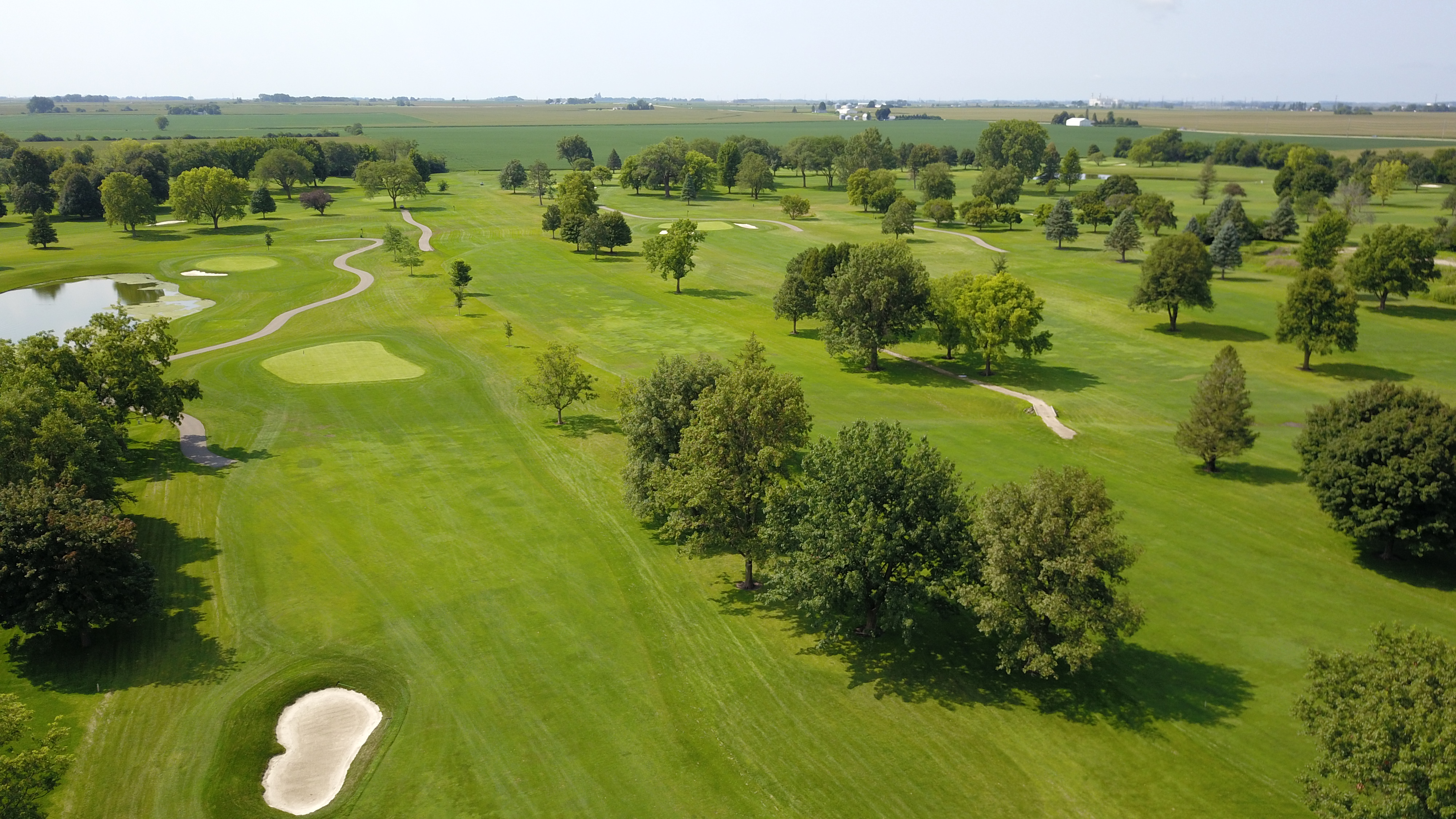 Aerial view of the property, lot, and Legacy Golf Course fairway