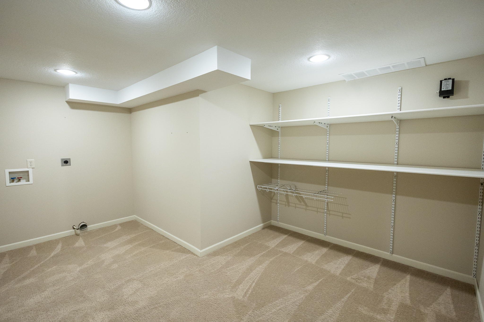 Storage room with built-in shelving